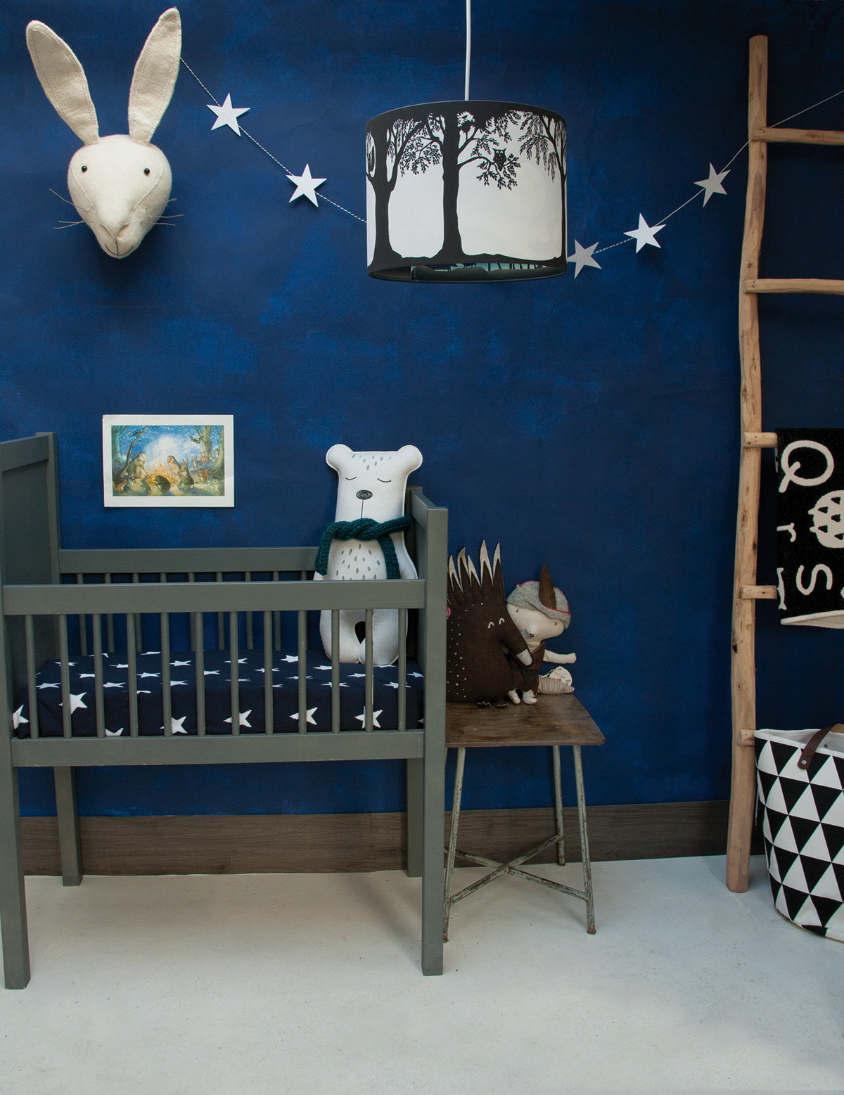 Full Moon pendant lamp by Hartendief by day against a blue wall – handmade nursery lamp