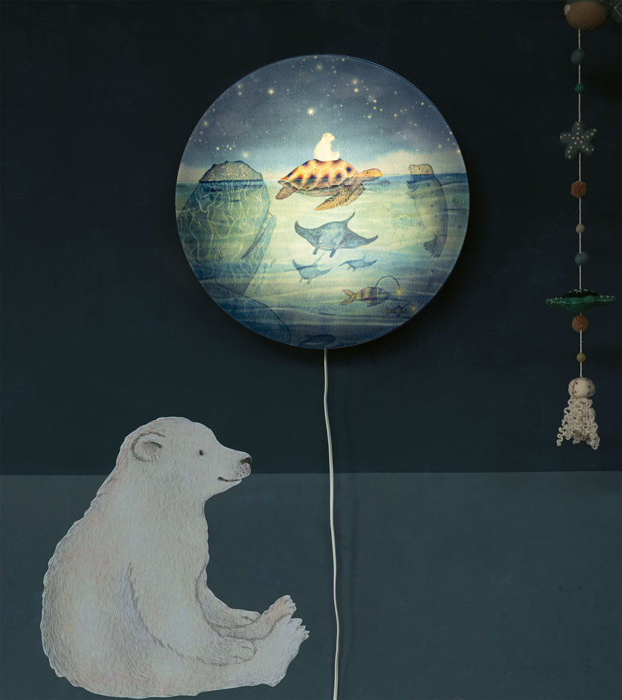 Turtle Dream wall lamp by Hartendief in a nursery with the Little Polar Bear wall decal – dive into the deep sea