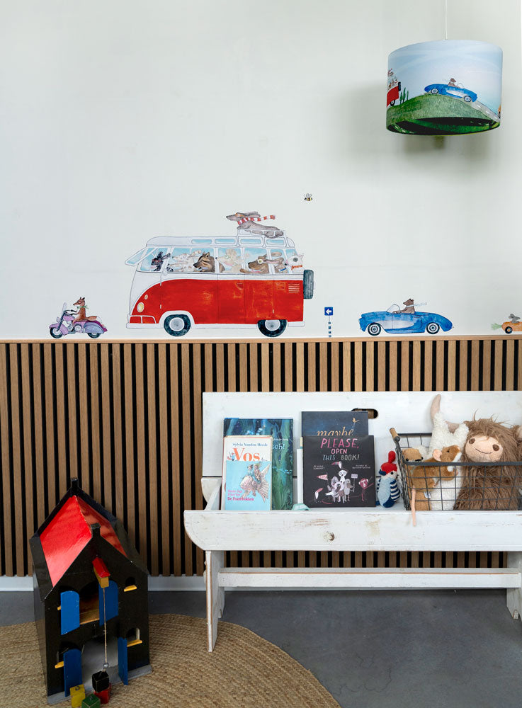 Red Camper wall decal by Hartendief on wall paneling in a nursery with Night Riders pendant lamp